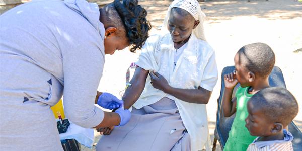 Fieldwork for the ARK study in Agincourt_Study nurse Phumzile Dlamini does a home visit for a blood sample to assess kidney function in a consenting participant_Pic Sandra Maytham Bailey 600x300